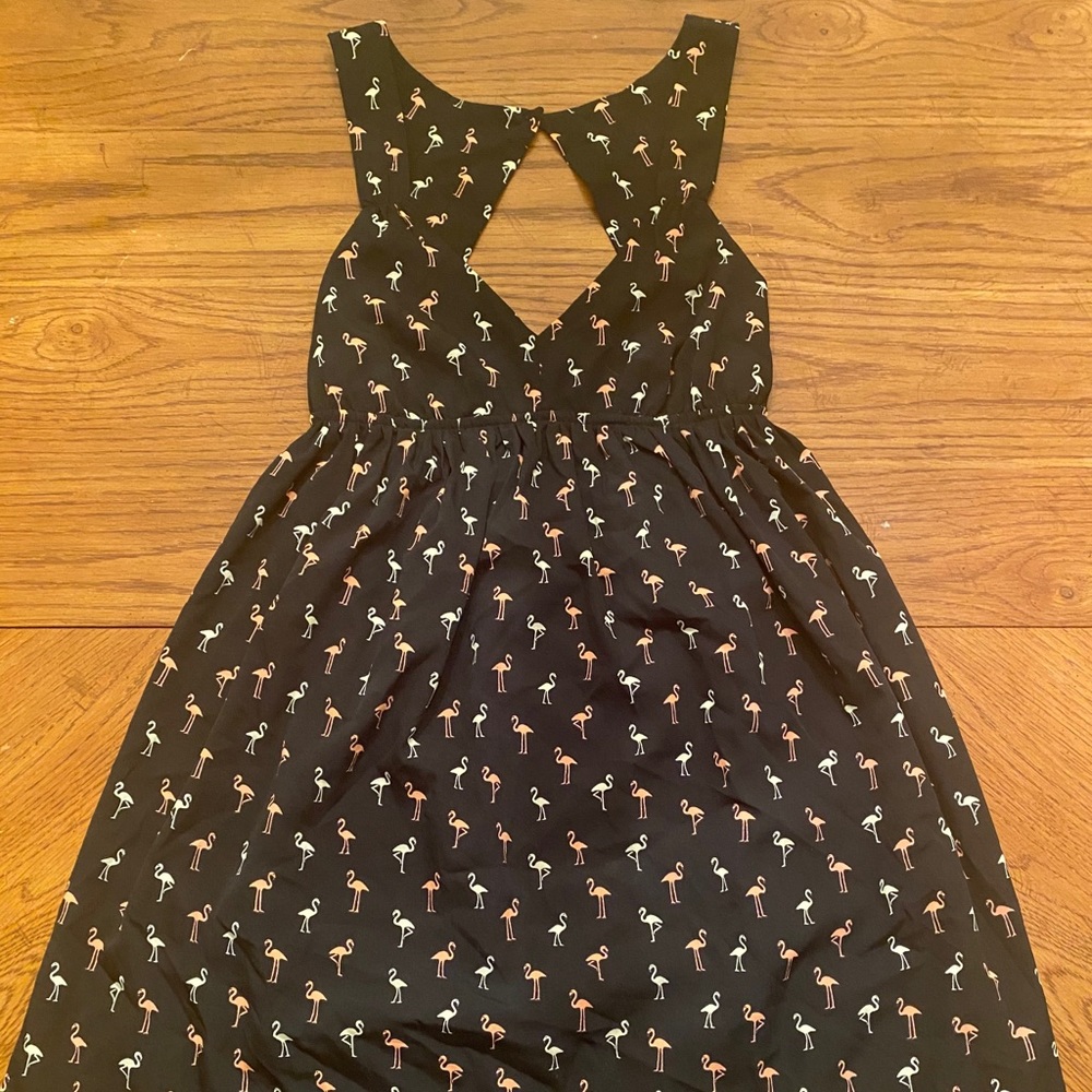 Sun dress with flamingo print.